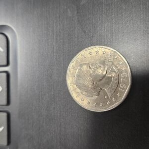 Liberty Coin on Black Surface